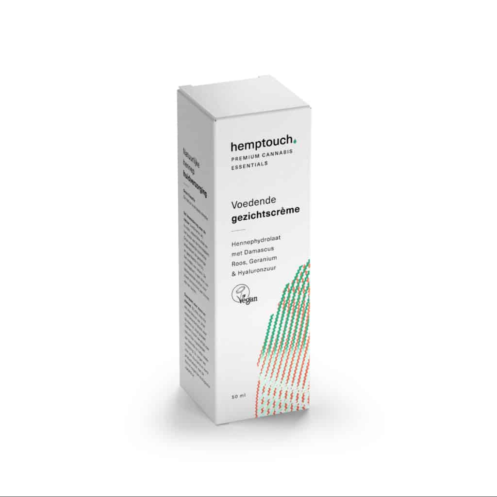 Une boîte de Hemptouch Crème de visage nourrissante avec CBD (50 ml/50 mg) sur fond blanc.